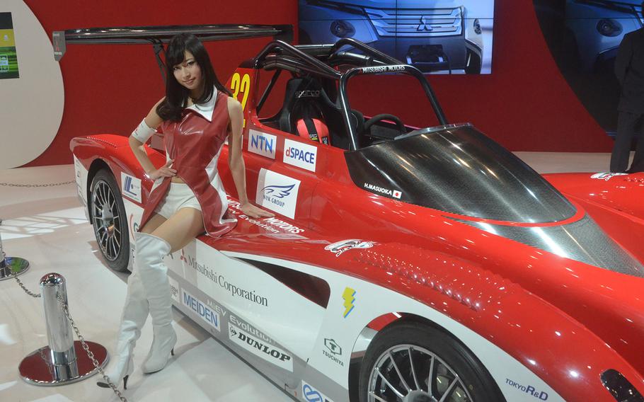 Hiroshi Masuoka's Mitsubishi racer is on display at the 2013 Tokyo Motor Show.