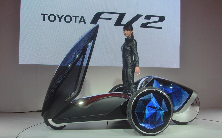 Toyota shows off its FV2 driving simulator at the 2013 Tokyo Motor Show.