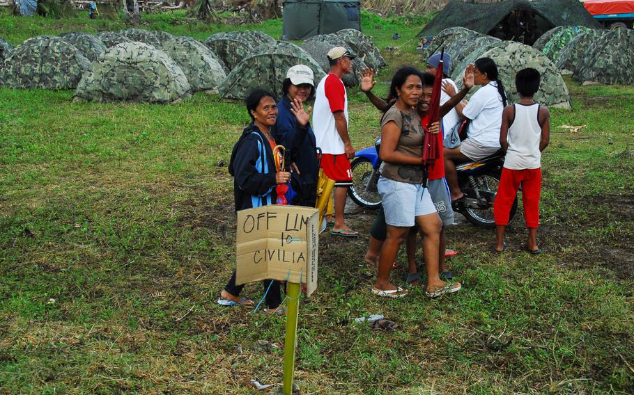 U.S. Marines were camped close to where typhoon survivors waited for air evacuation at Guiuan on Thursday, Nov. 21, 2013.