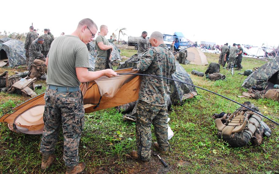 U.S. Marines break camp at Guiuan, Philippines, on Nov. 22, 2013. After more than a week on the ground helping Typhoon Haiyan victims, the Marines are packing up and heading back to Okinawa.