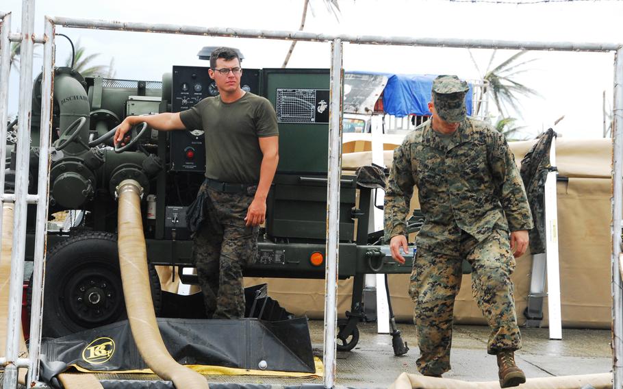 Marines empty their tanks of jet fuel out of a forward refueling point at Guiuan in the Philippines on Nov. 22, 2013. After more than a week on the ground helping Typhoon Haiyan victims, the Marines are packing up and heading back to Okinawa.