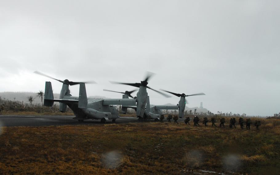 Marine Ospreys prepare to take off from the Guiuan airport in the Philippines on Nov. 22, 2013. After more than a week on the ground helping Typhoon Haiyan victims, the Marines are packing up and heading back to Okinawa.