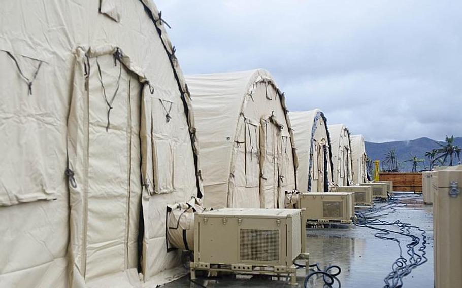Shelters were donated to the Philippines to help house refugees and non-government organization volunteers. The shelters were stood up near Tacloban Airport, Tacloban, Philippines on November 21, 2013.