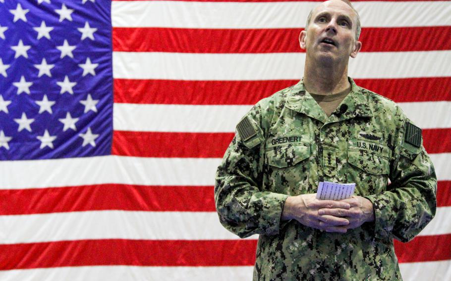 Adm. Jonathan Greenert, chief of naval operations, responds to a sailor's question at an all-hands call on Naval Support Activity Bahrain on Wednesday Nov. 27, 2013.