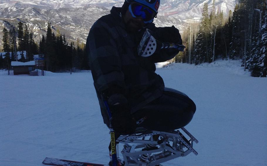 Retired Marine Joshua Elliott on his monoskis.