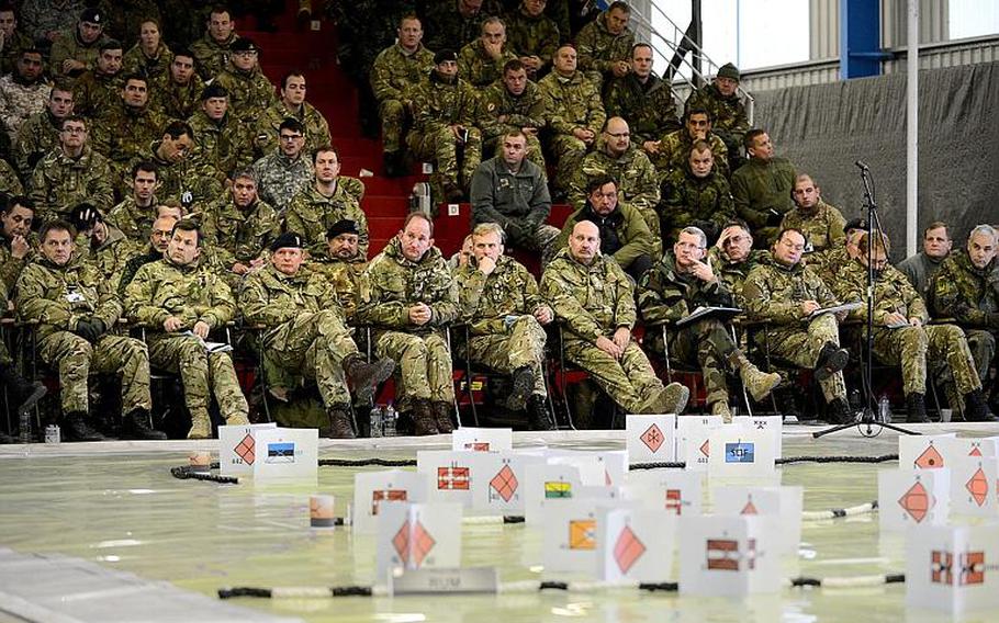 Senior officers work on operational plans during Arrcade Fusion 13, a NATO exercise aimed at testing the capabilities of the alliance's Rapid Reaction Corps. The exercise in the United Kingdon ended on Friday, Nov. 29, 2013.
Mike O'Neill/Courtesy UK Ministry of Defense