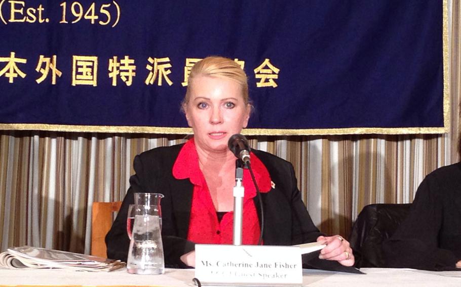 Catherine Jane Fisher, who recently settled with a former U.S. sailor she accused of raping her in 2002, speaks to reporters in Tokyo during a November press conference. A Milwaukee circuit court upheld the validity of a Japanese civil court ruling in her favor.