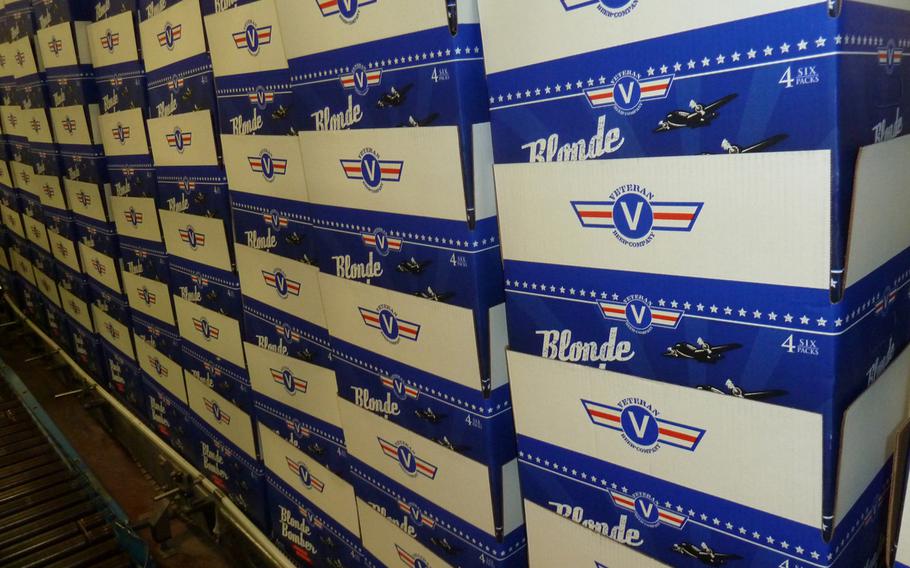 Stacks of boxes for Veteran Beer Company's Blonde Bomber American Blonde Ale sit idly during their first production run in November 2013.