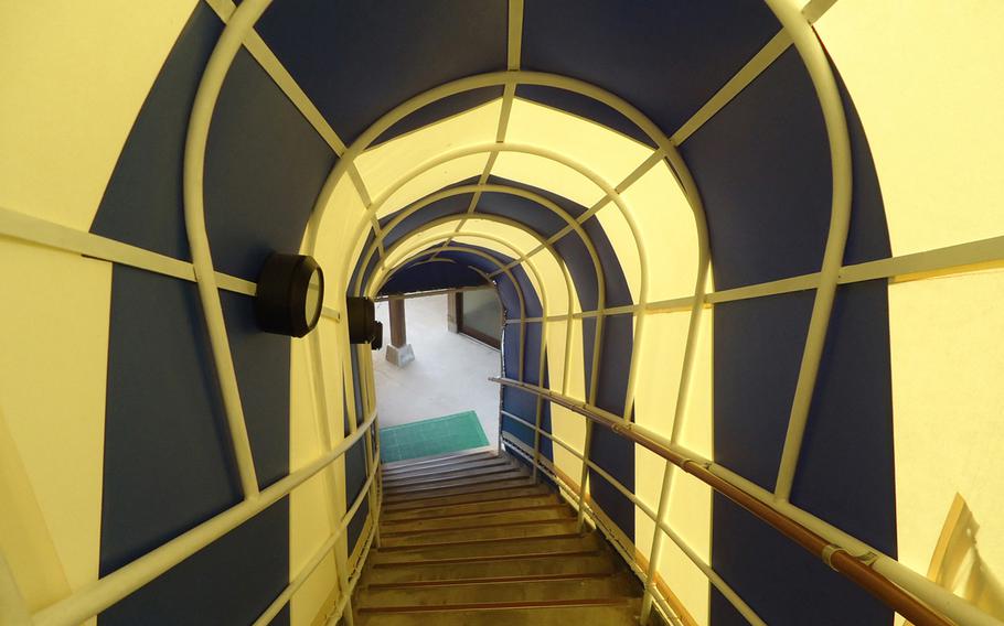 Down the rabbit hole: An enclosed staircase protects you from the elements as you make your way down to the outdoor private onsens at the Hirado Kaijyo Hotel.