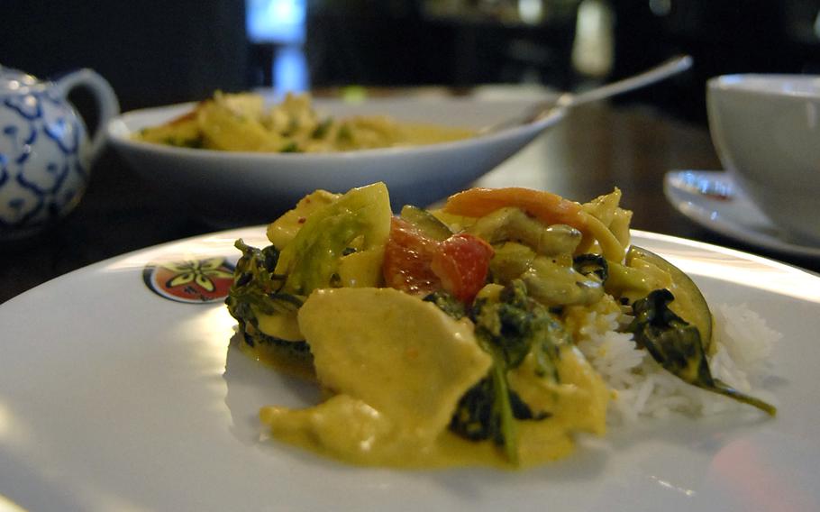 The chicken breast with green curry, coconut milk and vegetables with rice is one of several Thai dishes available at Zimtblüte, a restaurant specializing in Asian food in Einsiedlerhof, Germany.