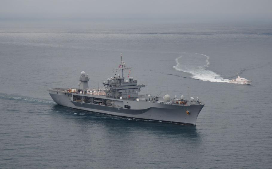 The U.S. 6th Fleet flagship USS Mount Whitney, left, steams in formation with Georgian coast guard ship Sokhumi P-24, while underway in the Black Sea, Nov. 13, 2013.
