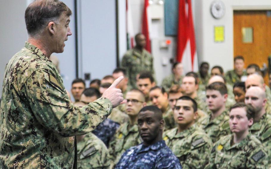 Rear Adm. Sean Buck, the director of the 21st Century Sailor office, addresses a group of E-6 and below sailors at an all-hands call on Naval Support Activity Bahrain, Feb. 6 2014. Buck is on a six-month worldwide tour to promote the office, whose purpose is to help sailors in handling a wide variety of challenges.