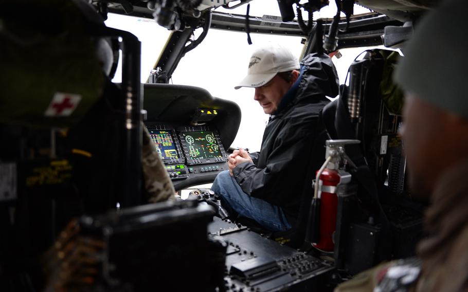 Chip Charette, a Sikorsky employee, assists a Task Force Demon flight team with maintenance and testing on a frigid day in early February. When snow and generally gruesome weather shut down most flight operations for a week, flight teams used the time to catch up on maintenance and administrative tasks.