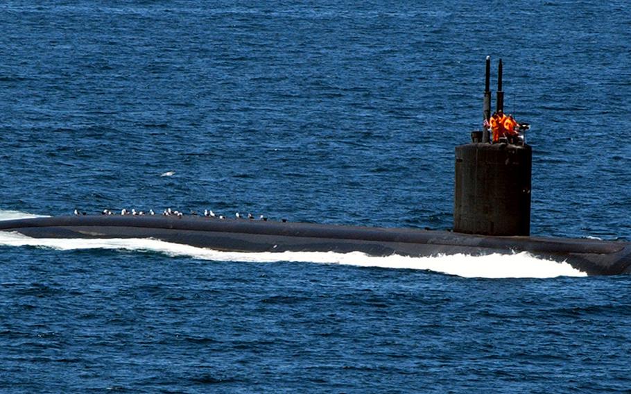 050427-N-7130B-047
Pacific Ocean (April 27, 2005) - The Los Angeles-class fast attack submarine USS Jefferson City (SSN 759) underway near San Diego Harbor after conducting routine operations in the Pacific Ocean. Fast attack submarines are designed to seek and destroy enemy submarines and surface ships. Their primary mission is to counter the treat of modern state-of-the-art non-nuclear submarines. U.S. Navy photo by Photographer's Mate 3rd Class Aaron Burd (RELEASED)