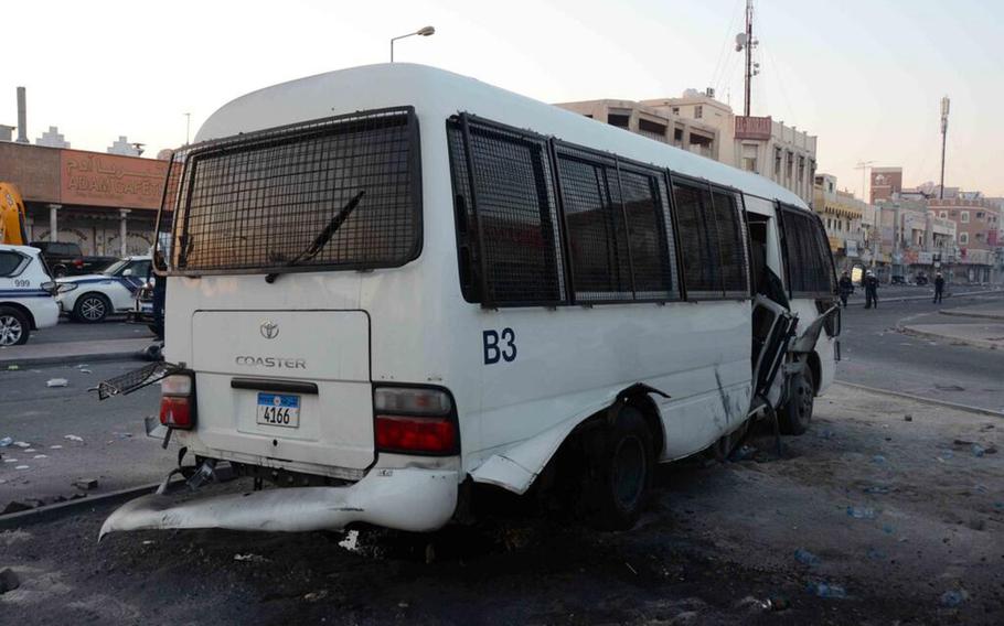 An explosion damaged a bus transporting police officers in Daih, Bahrain, on Feb. 14, 2014. U.S. military officials have issued a warning to servicemembers and personnel in the island nation regarding the risk of bomb attacks.