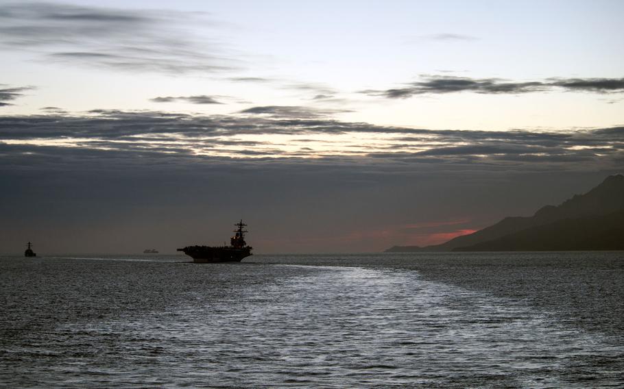 The aircraft carrier USS George H.W. Bush transits the Strait of Gibraltar Feb. 27, 2014.