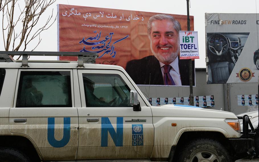 A grinning Abdullah Abdullah graces a billboard in Kabul advertising his candidacy for the Afghan presidency. The billboards and posters were put up on Feb. 2, 2014, as candidates were officially allowed to begin campaigning.