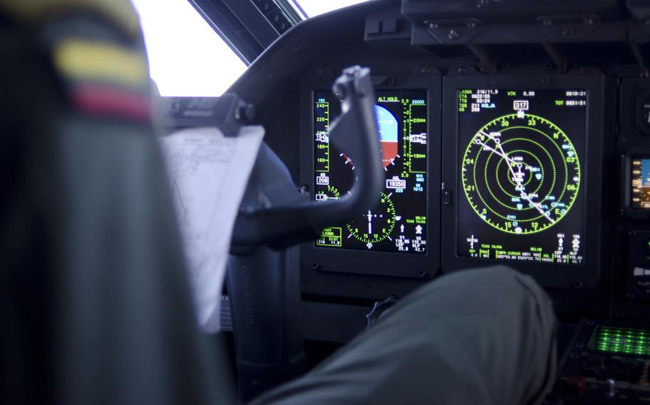 A Lithuanian C-27 aircraft flies toward Sweden from Siauliai air base, Lithuania, to participate in a training event on Tuesday, April 1, 2014. The training gave fighter pilots a chance to practice intercepting a plane that ceased communicating with officials on the ground.