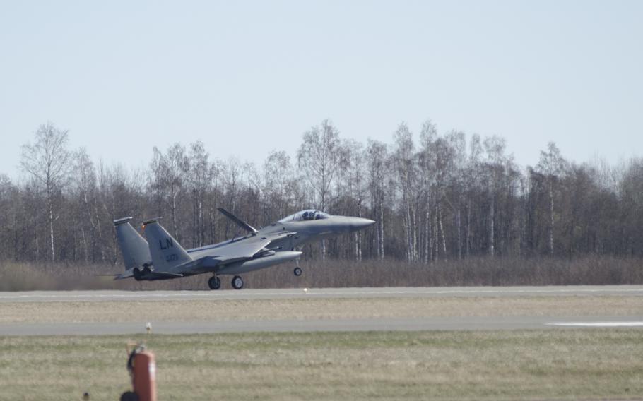 An F-15C Eagle lands at Siauliai air base, Lithuania, on Tuesday, April 1, 2014. Fighters from the base escorted a plane simulating a communications blackout from the Baltic Sea as part of a training event with NATO and Sweden.