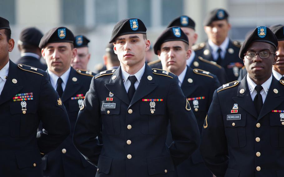 Soldiers of the 21st Theater Sustainment Command's Special Troops Battalion stand in formation Thursday, April 3, 2014, during a uniform inspection. The ritual used to be a regular occurrence in the Army, but largely fell by the wayside over the past decade. The 21st is bringing them back as part of the unit's monthly "Millrinder Time."
