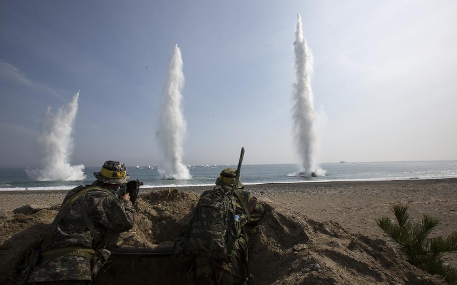 Republic of Korea marines observe water explosions as assault amphibious vehicles approach shore during the Ssang Yong 14 exercise at Doksu-ri Beach, Pohang, South Korea, on March 31, 2014.