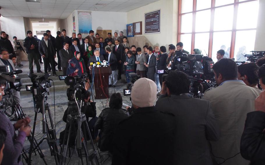 Mohammad Youssuf Nuristani, head of the Afghan government's election organizing body, the Independent Election Commission, gives a news conference after voting in Afghanistan's presidential election on Saturday, April 5, 2014.