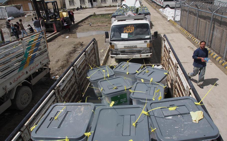 Trucks full of ballot boxes were lined up at Afghanistan's Independent Election commission on Sunday, April 6, 2014, a day after an estimated seven million Afghans voted in the country's presidential election. Whoever is declared winner will inherit deep corruption and dysfunction in much of the government.