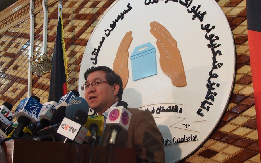 Nadir Muhseni, a commissioner with Afghanistan's Electoral Complaints Commission, speaks on Tuesday, April 8, 2014, announcing that more than 3,000 complaints about Saturday's Afghan presidential election have been filed. Muhseni said the number was down from the last presidential election, held in 2009.
