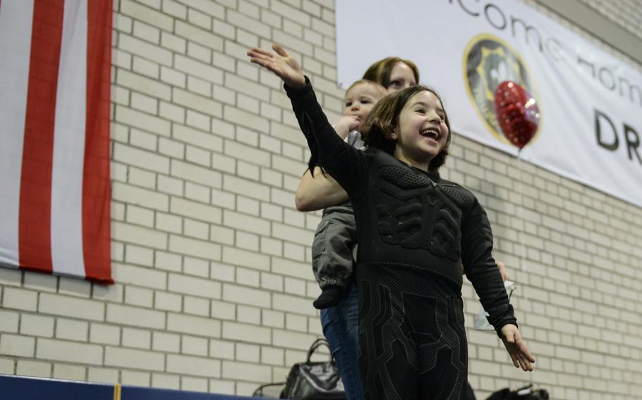 Jaden Monteleone, 5, sees her father for the first time after a seven-month deployment to Afghanistan, April 8, 2014.