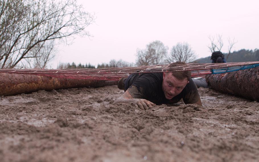 Nobody came through clean at the mud crawl at the Grafenwöhr Rugged Terrain Obstacle Course, April 12, 2014.