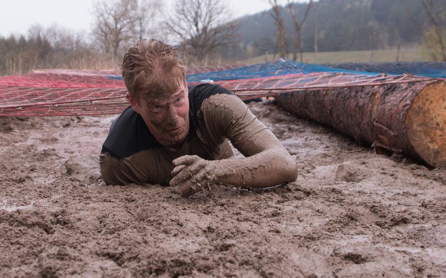 Nobody came through clean at the mud crawl at the Grafenwöhr Rugged Terrain Obstacle Course, April 12, 2014.
