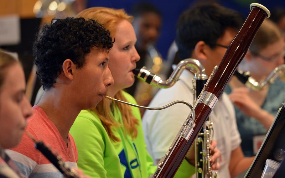 Kaiserslautern's Andrew White plays the bassoon and Ramstein's Katherine Enyeart the bass clarinet as they rehearse a number with the band at the Department of Defense Dependents Schools-Europe Honors Music Festival, Tuesday, April 15, 2014.