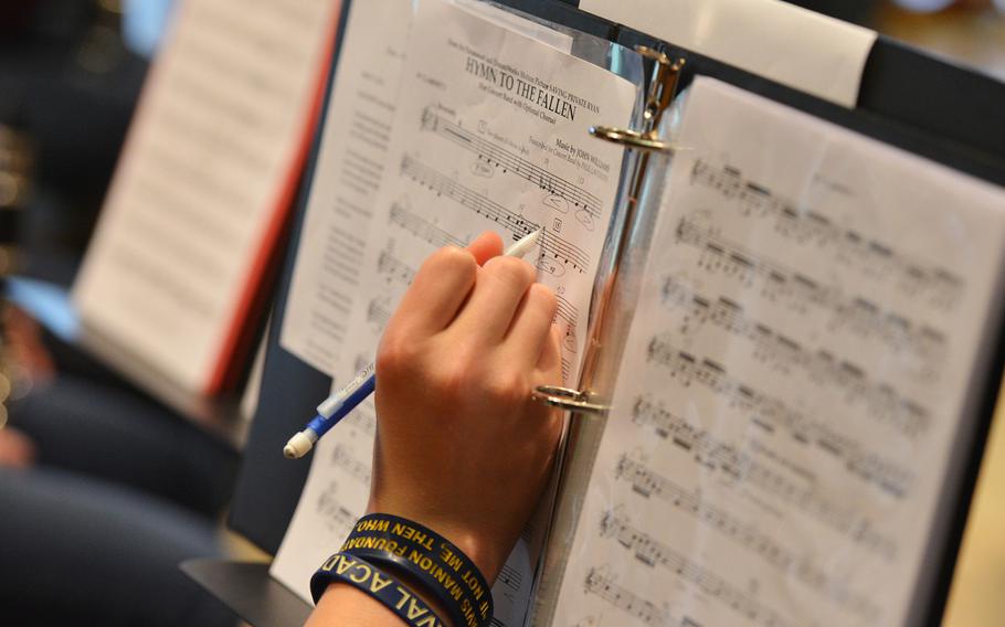 Ramstein clarinetist Thomas Davey makes an adjustment to his notes as he rehearses with the band at the Department of Defense Dependents Schools-Europe Honors Music Festival, Tuesday, April 15, 2014.