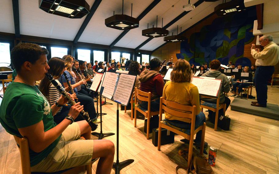The band rehearses a number under conductor Cecil Wilder at the Department of Defense Dependents Schools-Europe Honors Music Festival, Tuesday, April 15, 2014.