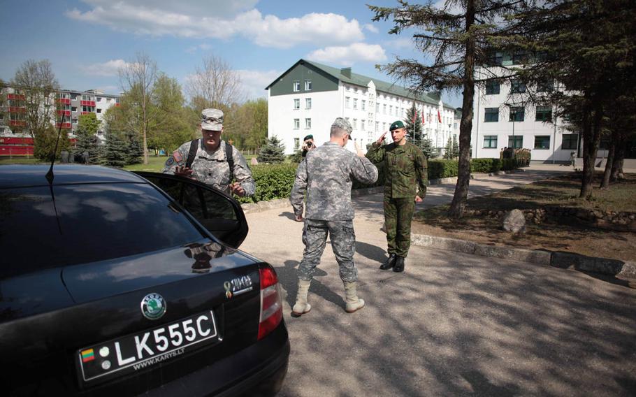 Lt. Gen. Donald Campbell, commander of U.S. Army Europe, is greeted by Lithuanian Col. Raimundas Vaiksnoras, commander of his country's "Iron Wolf" brigade. Campbell is on a trip to visit U.S. troops of the Vicenza, Italy- based 173rd Infantry Brigade Combat Team, who deployed to the Baltic states and Poland to reassure NATO allies concerned about Russian aggression.