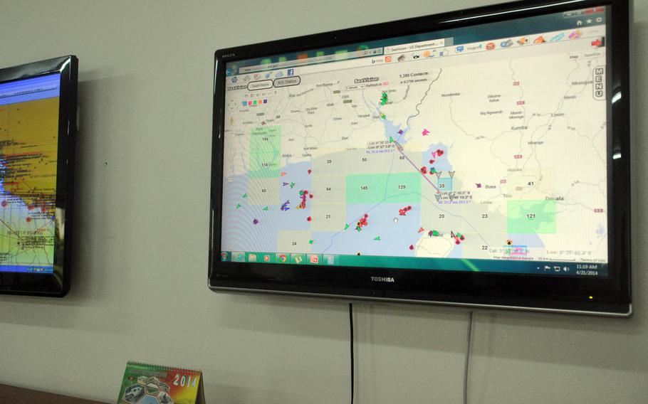 A monitor inside a maritime operations center in Idenau, Cameroon, shows the interface for SeaVision, a Web-based maritime monitoring tool developed by the U.S. Department of Transportation and used by African countries for a common picture of marine traffic and threats.