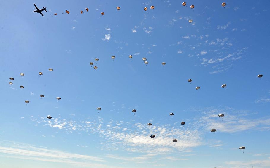 The sky over Normandy was filled with parachutes as more than 600 international troops, including more than 400 Americans, landed at La Fi??re drop zone in a 70th anniversary of D-Day commemoration near Cauquigny, France, Sunday, June 8, 2014.