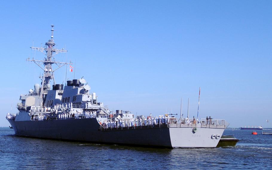 Sailors aboard USS Ross man the rails as they depart their Norfolk homeport. Ross is the second of four Arleigh Burke-class guided-missile destroyers to be forward deployed to Rota, Spain.