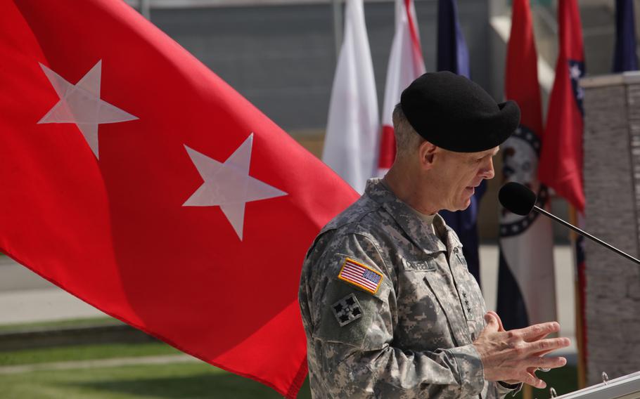 Lt. Gen. Donald M. Campbell Jr. speaks at a ceremony welcoming German Gen. Markus Laubenthal as U.S. Army Europe's first non-U.S. chief of staff, on Aug. 28, 2014.