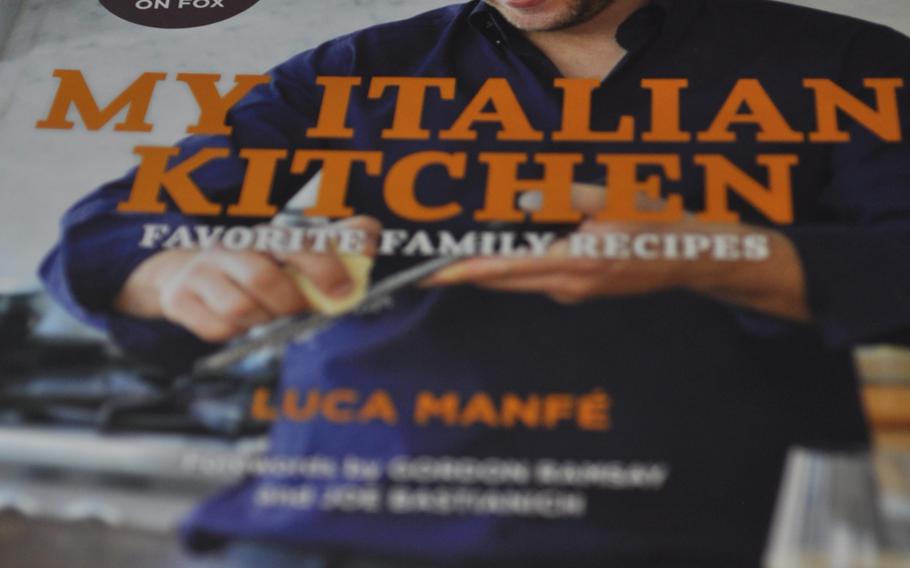 A copy of Luca Manfé's book sits on his mother's table in Aviano, Italy.