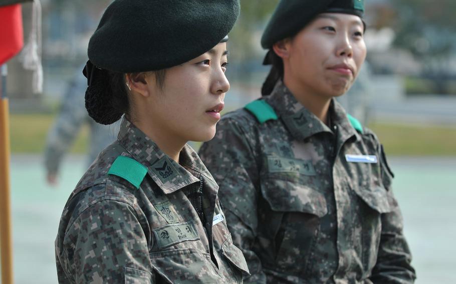 South Korean Staff Sgt. Kwon Minzy takes a break during the during Expert Infantryman Badge training last month at Camp Casey. Kwon, along with Staff Sgt. Kim Min Kyoung, became the first South Korean females to earn the badges.