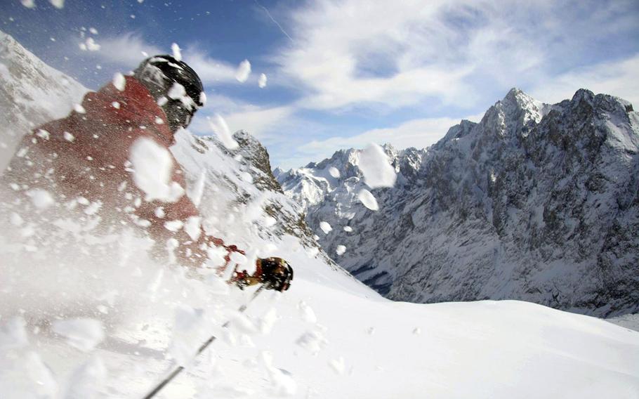 American Leigh Plowman cuts through some powder on the Zugspitze at Edelweiss Lodge and Resort in Garmisch-Partenkirchen, Germany. The resort has served the American military and their families for 10 years.