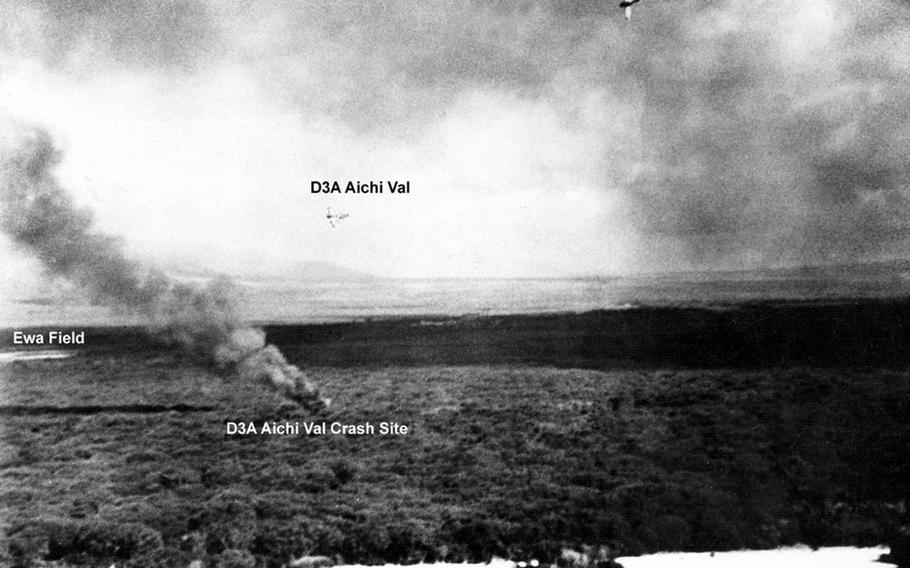 Army photographer Lee Embree snapped this photo of the crash site of a Japanese dive bomber while he was aboard a B17 on the morning of the Dec. 7, 1941, attack on Hawaii by the Japanese.