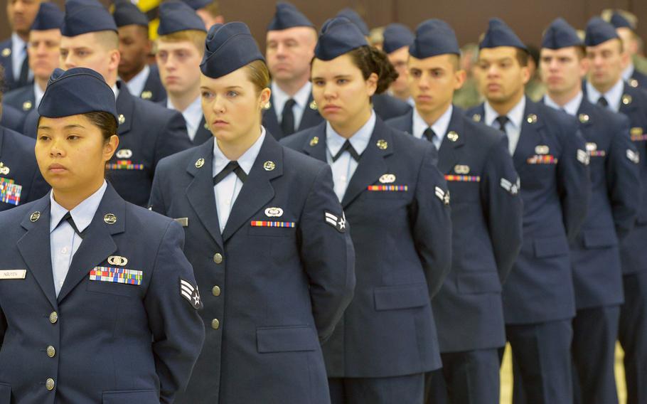 Airmen of the 52nd Fighter Wing stand in formation at the beginning of the assumption of command ceremony for Col. Joseph McFall at Spangdahlem Air Base, Germany, Thursday, Feb. 5, 2015.