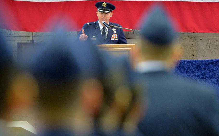 The new commander of the 52nd Fighter Wing, Col. Joseph McFall talks to his airmen during the assumption of command ceremony at Spangdahlem Air Base, Germany, Thursday, Feb. 5, 2015.