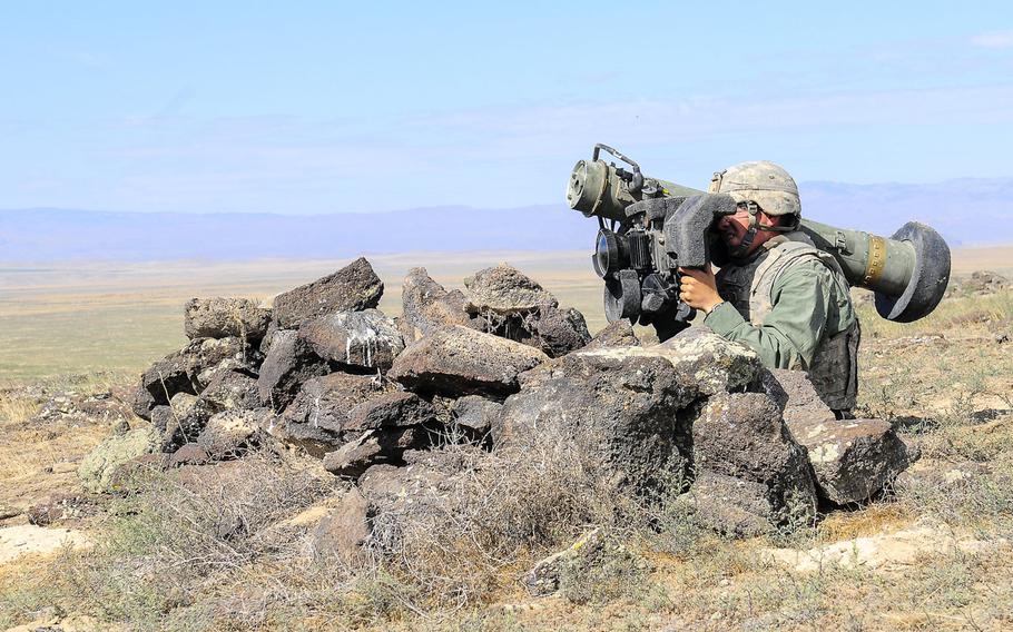 Spc. Vincent de Ruiter, a combat medic with 1st Squadron, 14th Cavalry Regiment, prepares to fire a Javelin missile launcher during a training exercise at Idaho's Orchard Combat Training Center in August 2014. As fighting persists in eastern Ukraine, pressure could grow for the U.S. to send lethal arms, such as the anti-armor Javelin system, to Ukrainian troops.