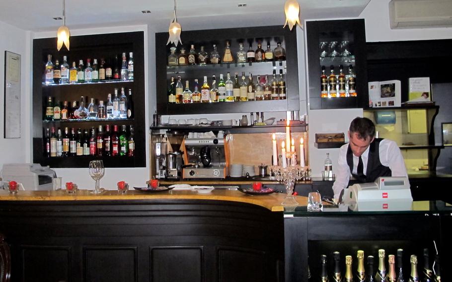 The beautiful bar at tira tardi, an upscale restaurant in Vicenza, Italy. Things get busier later in the evening.