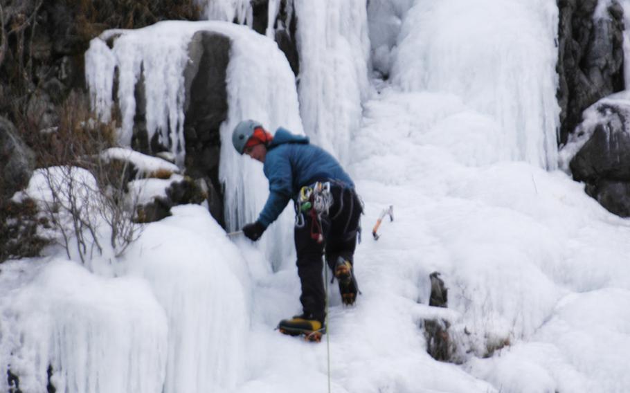 An ice climber near Anchorage, Alaska, in February 2015. Outdoor activities are big among military members stationed there.