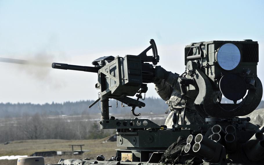 Dragoons assigned to the 2nd Cavalry Regiment participate in their unit's live-fire exercise at the Grafenwoehr Training Area, located near Rose Barracks, Germany, Feb. 27, 2015.