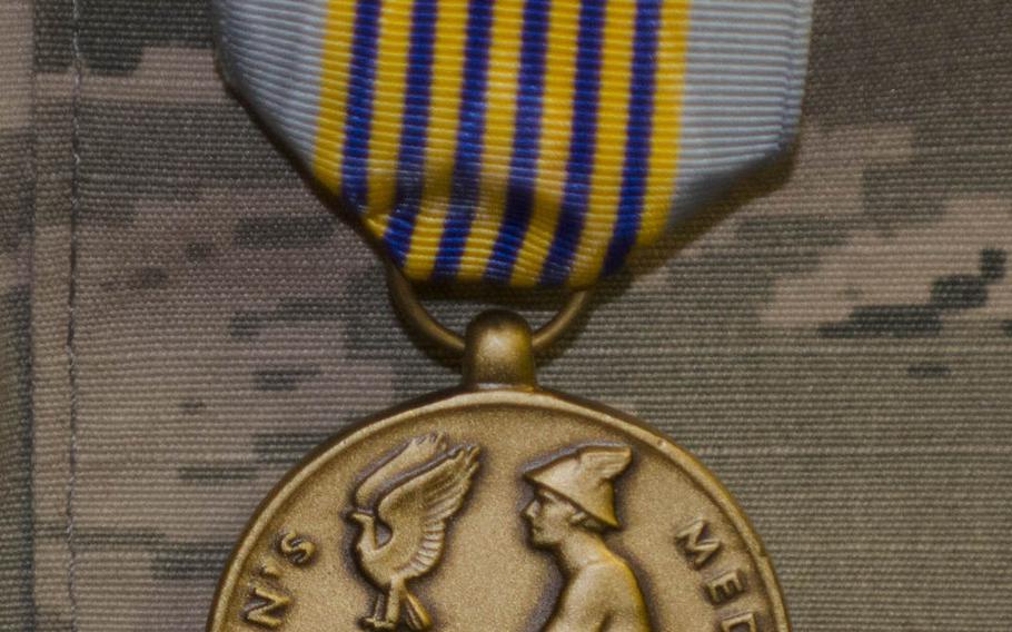 U.S. Air Force Staff Sgt. Greggory Swarz wears the Airman's Medal on Friday, March 13, 2015, at RAF Lakenheath, England. Swarz received the medal for helping to save the lives of three French servicemembers after an F-16 crashed in Spain in January during a multinational exercise.